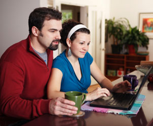 Two people searching the web