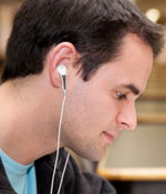 person listening to headphones