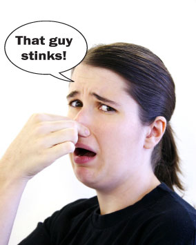 person holding nose and saying that guy stinks